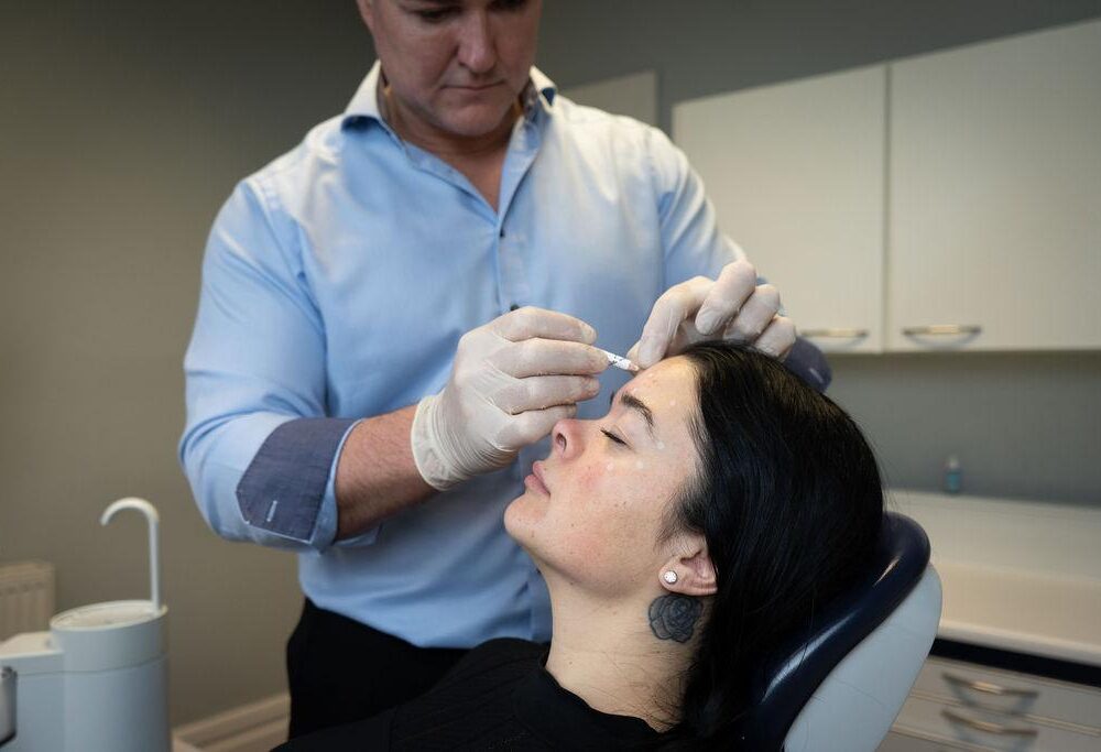 Botox injection to the forehead during botox and dermal fillers course